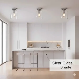 A minimalist kitchen flush mount light with a clear glass shade for maximum brightness.