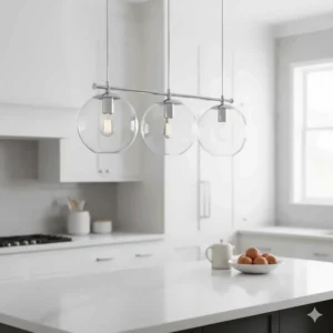 3-light pendant lighting featuring clear glass globes arranged linearly for a bright, airy kitchen island workspace.
