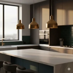 Brushed gold modern pendant lights adding a luxury focal point to a dark teal kitchen island.