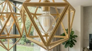 Bright Scandinavian living room featuring light wood furniture and a white geometric chandelier.