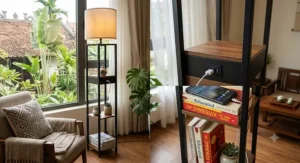 Modern floor lamp with shelves featuring a built-in USB charging port with a smartphone resting on the middle shelf.