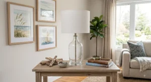 Clear glass table lamp styled on a coastal-inspired living room console table