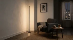 An LED dimmable torchiere floor lamp illuminating a dark corner of a modern apartment